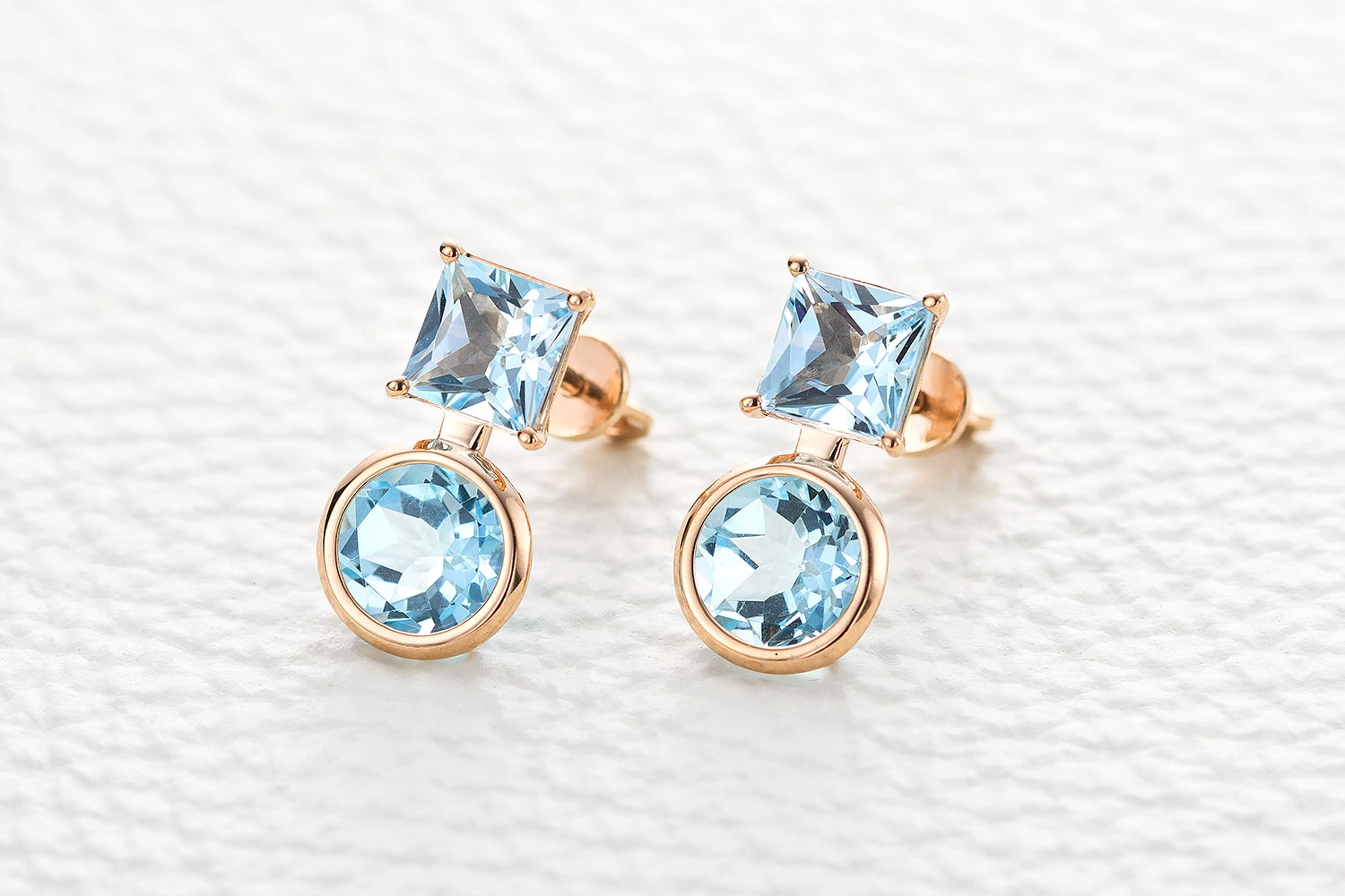 Серьги-пусеты из красного золота с 4 топазами sky