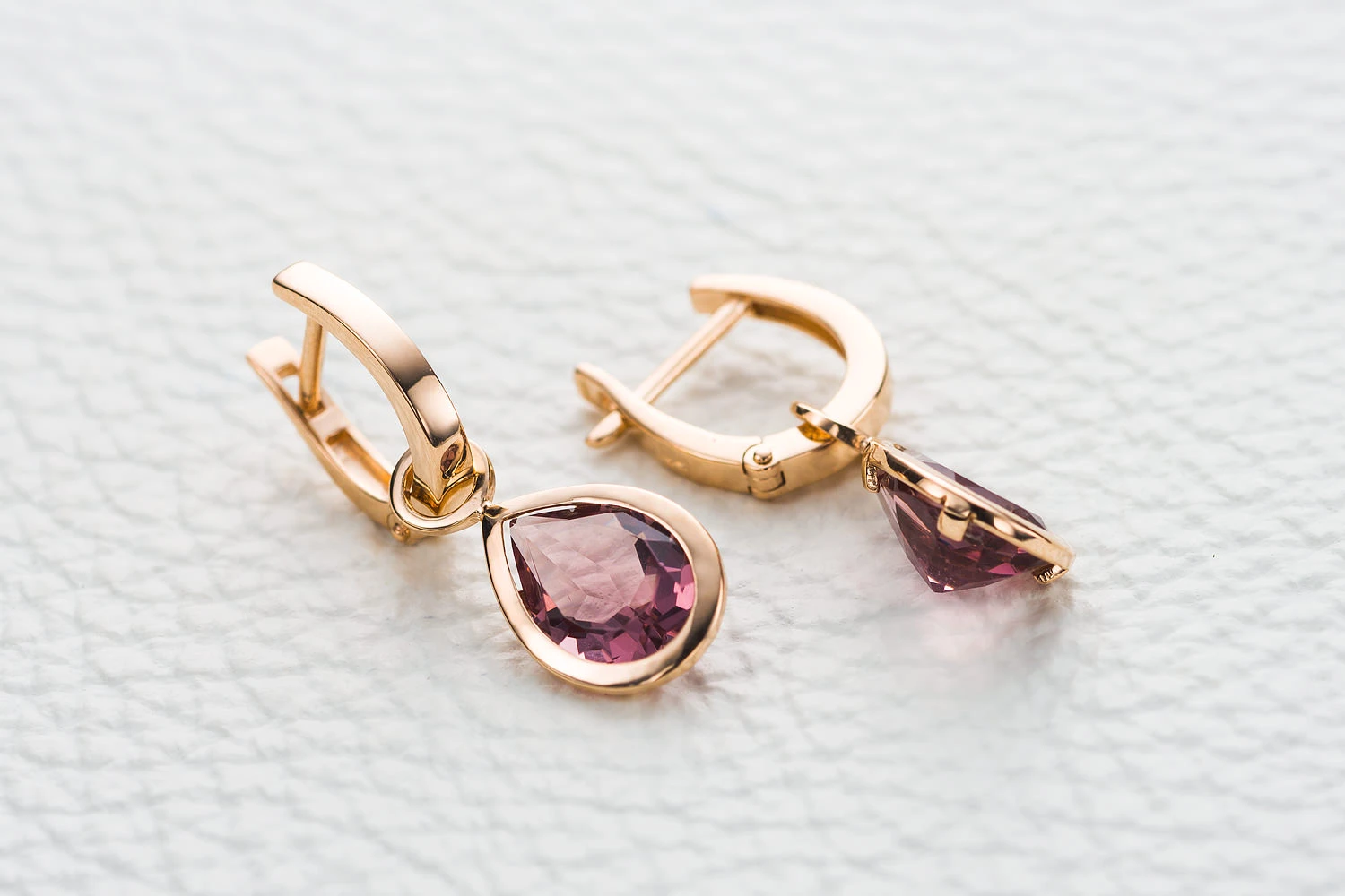 Серьги-трансформеры из красного золота с 2 кварцами