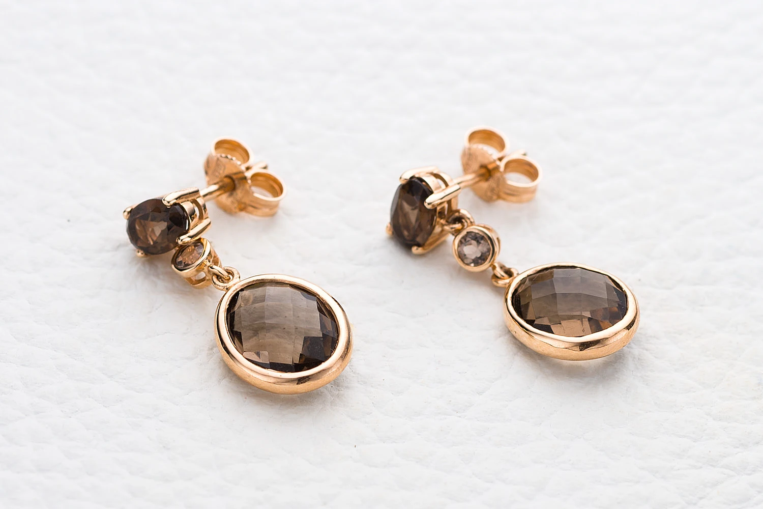 Серьги-пусеты из красного золота с 6 раухтопазами