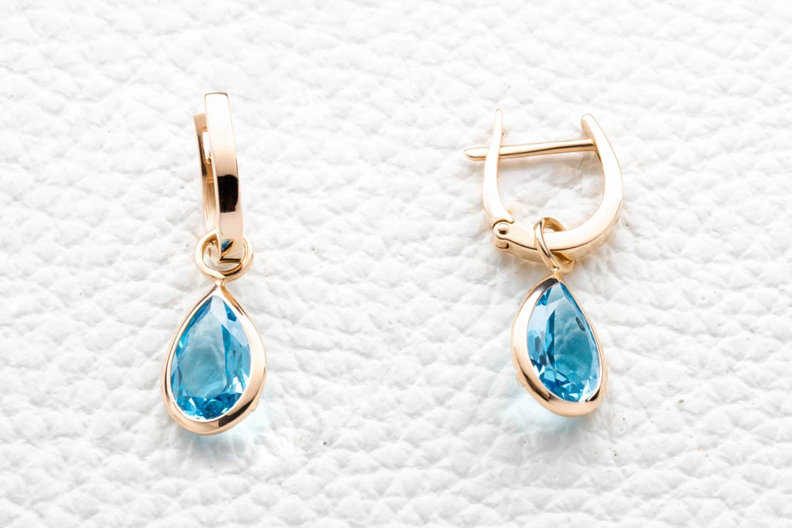 Серьги-трансформеры из красного золота с 2 топазами swiss