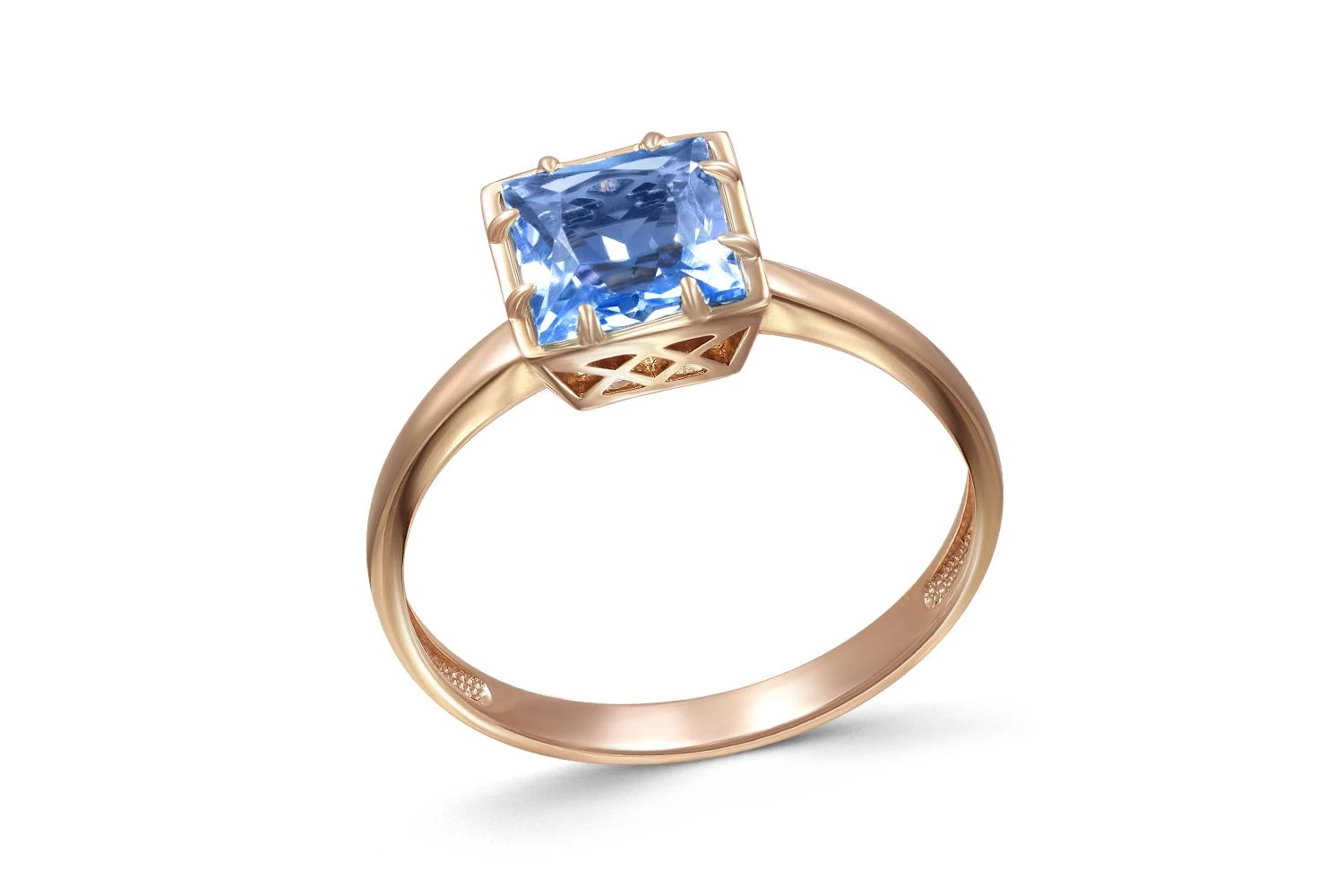 Кольцо из красного золота с топазом swiss