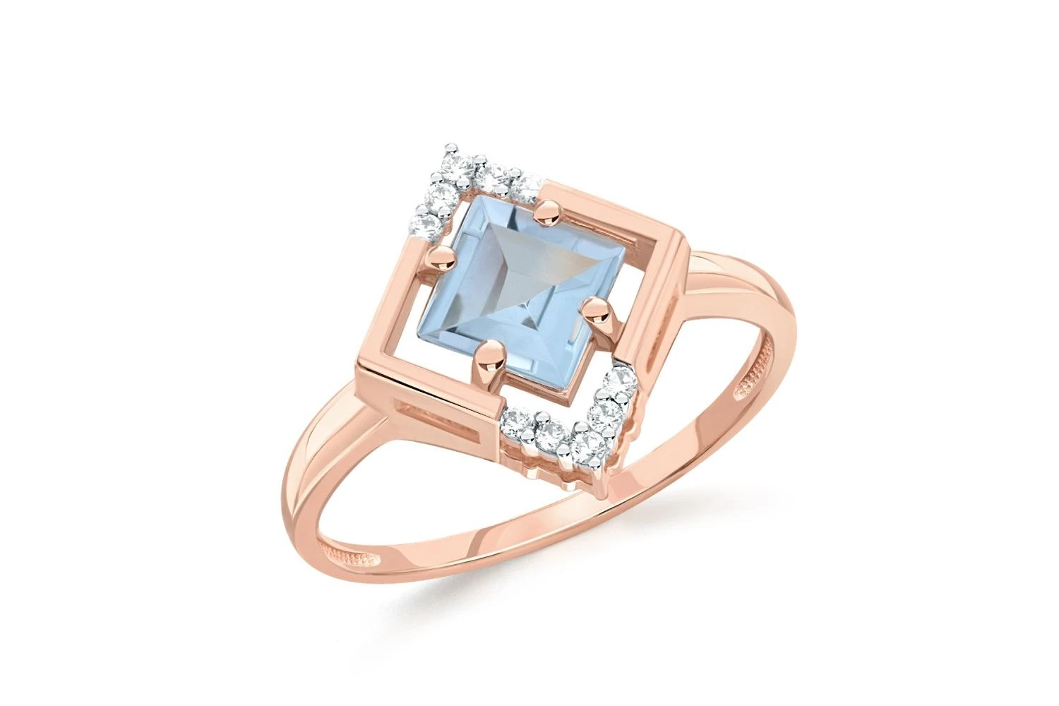 Кольцо из красного золота с топазом sky и 10 фианитами