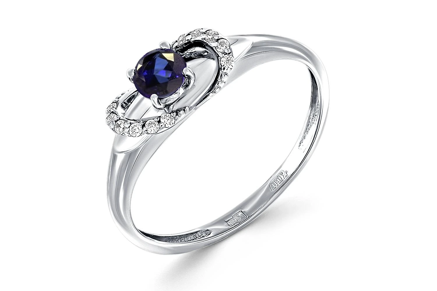 Кольцо из белого золота с корундом и 12 фианитами