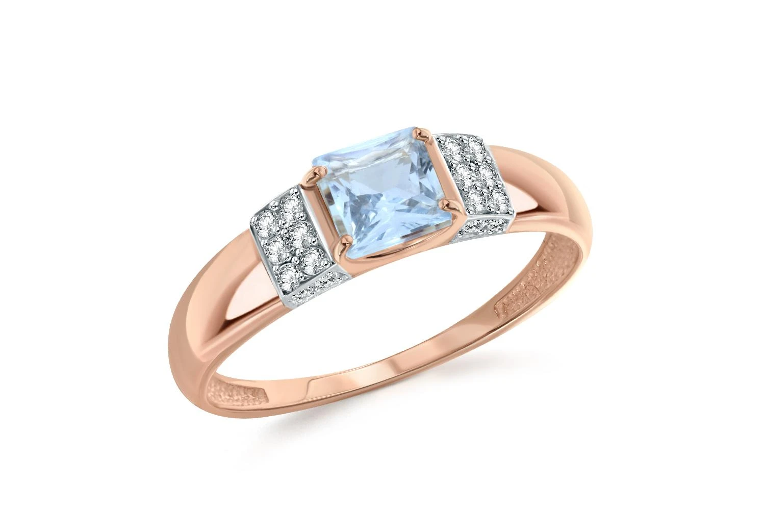 Кольцо из красного золота с топазом sky и 20 фианитами