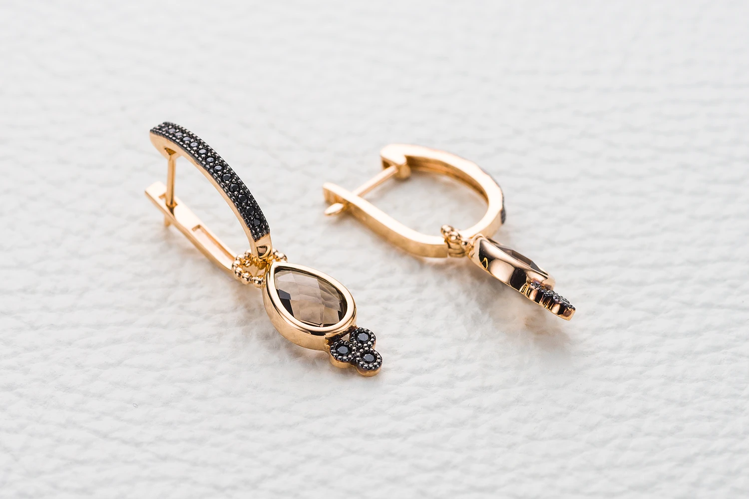 Серьги-трансформеры из красного золота с 2 раухтопазами и 6 фианитами