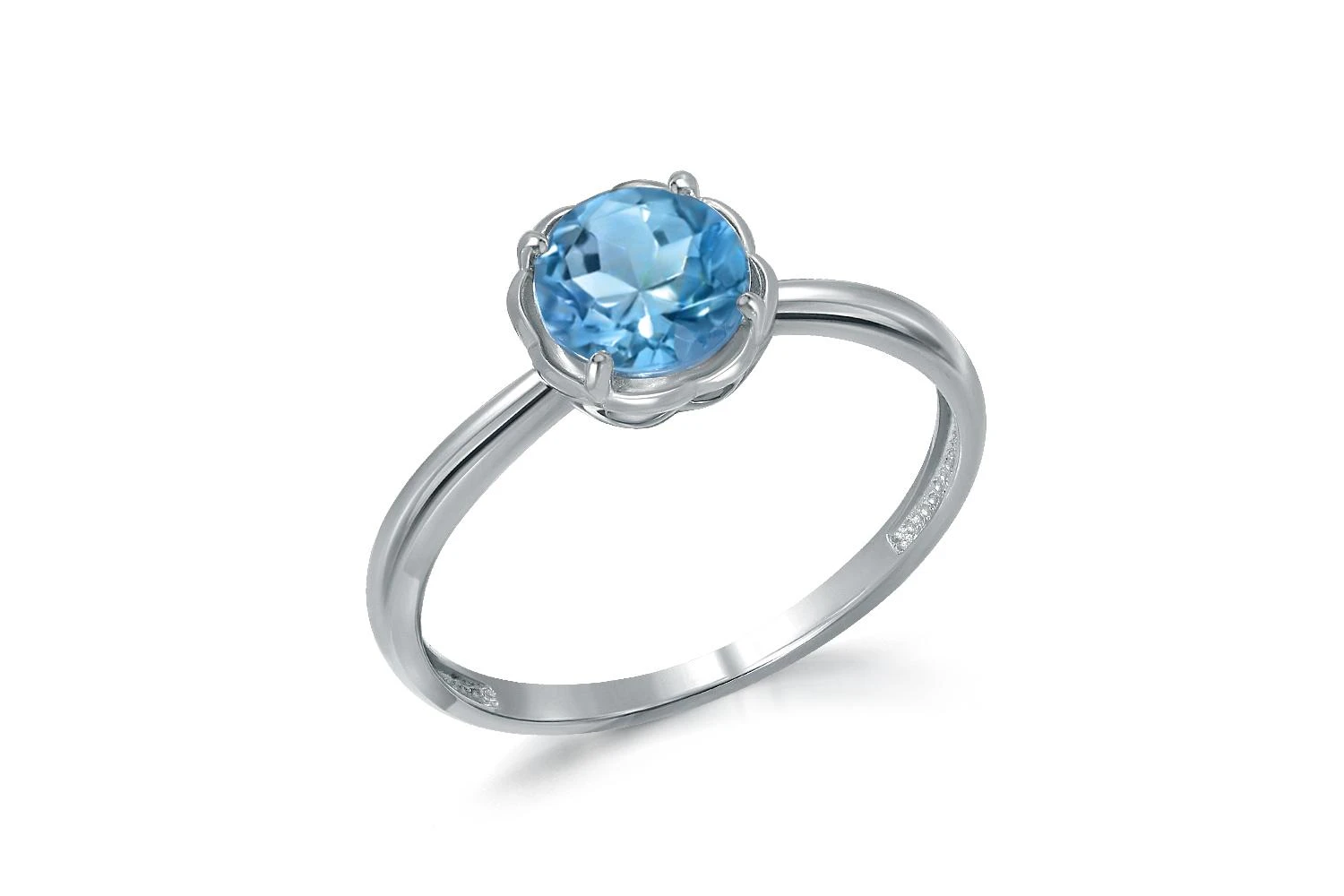Кольцо из белого золота с топазом swiss