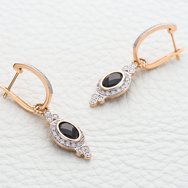 Серьги-трансформеры из красного золота с 2 гранатами и 70 фианитами