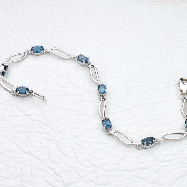 Браслет Дорожка из белого золота с 9 топазами лондон