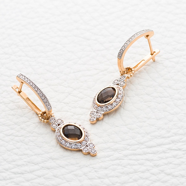 Серьги-трансформеры из красного золота с 2 раухтопазами и 70 фианитами
