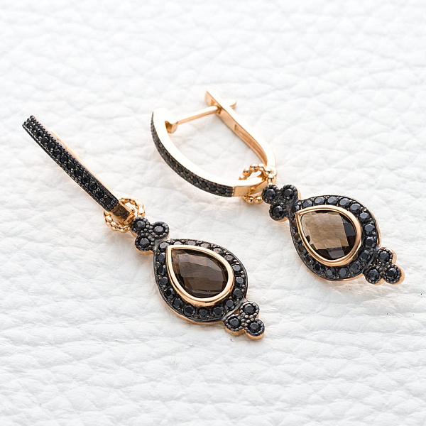 Серьги-трансформеры из красного золота с 2 раухтопазами и 74 фианитами