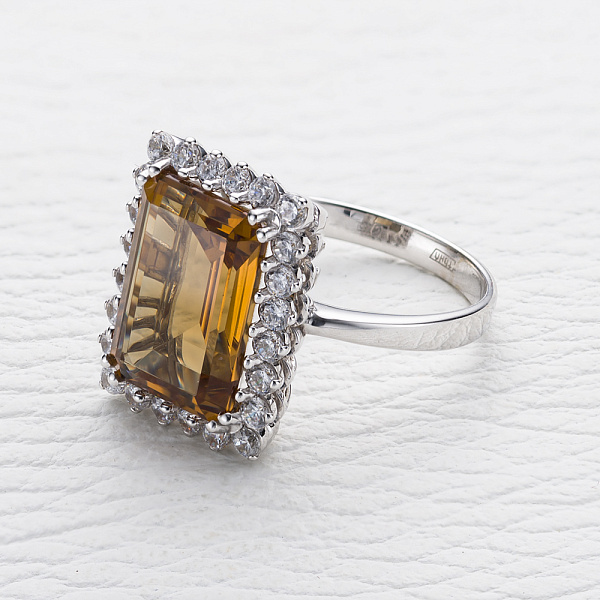 Кольцо из белого золота с султанитом и 24 фианитами