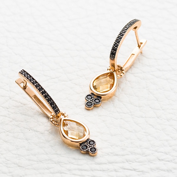 Серьги-трансформеры из красного золота с 2 цитринами и 32 фианитами