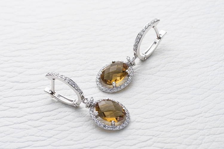 Серьги из белого золота с 2 султанитами и 74 фианитами