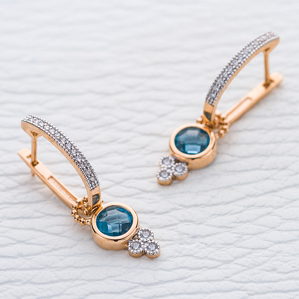Серьги-трансформеры из красного золота с 2 топазами swiss и 32 фианитами
