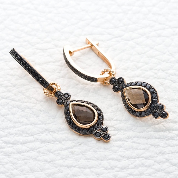 Серьги-трансформеры из красного золота с 2 раухтопазами и 74 фианитами