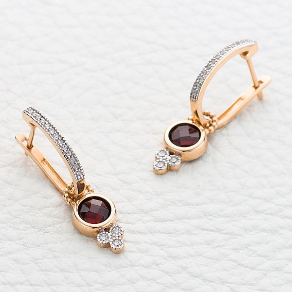 Серьги-трансформеры из красного золота с 2 гранатами и 32 фианитами