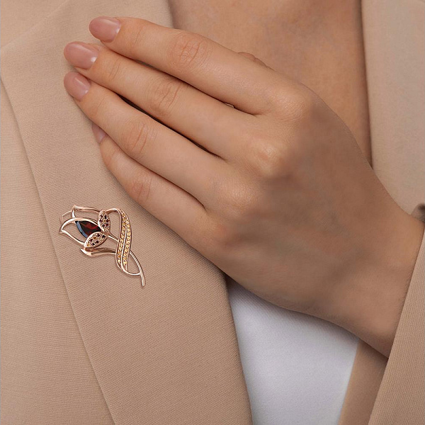 Брошь Цветок из красного золота с 12 гранатами и 29 цитринами