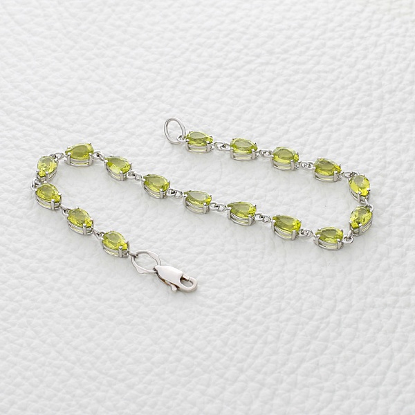 Браслет Дорожка из белого золота с 17 хризолитами