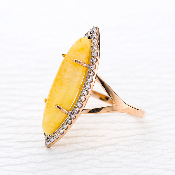 Кольцо из красного золота с янтарём и 40 фианитами