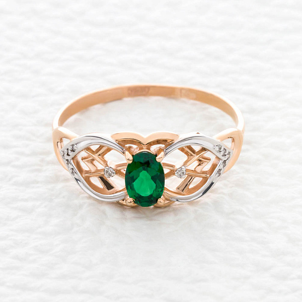 Кольцо из красного золота с изумрудом и 12 бриллиантами