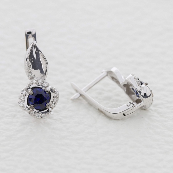 Серьги Цветы из белого золота с 2 корундами и 30 бриллиантами