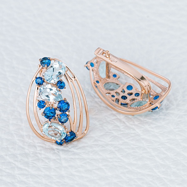 Серьги из красного золота с 6 топазами sky и 18 фианитами