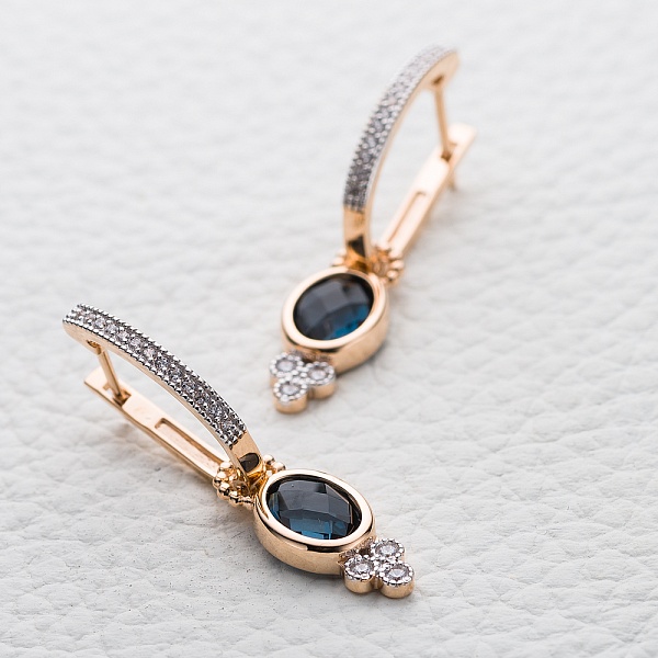 Серьги-трансформеры из красного золота с 2 топазами лондон и 32 фианитами