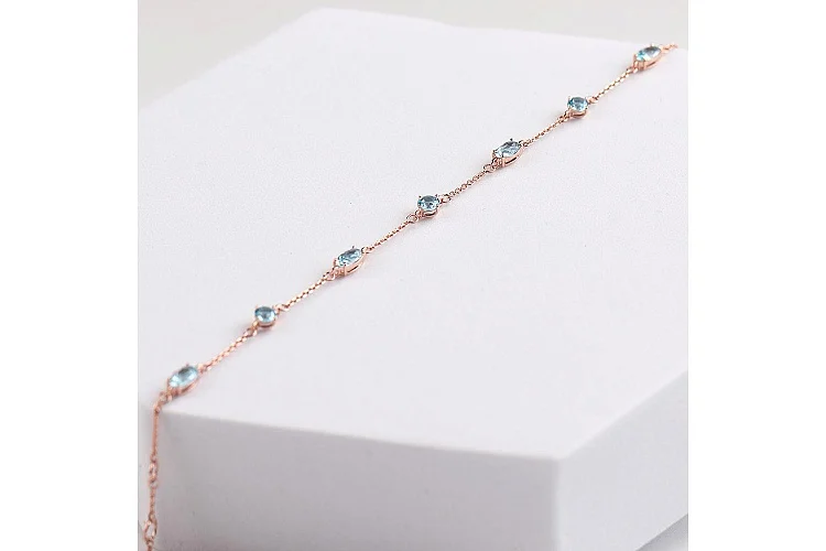 Браслет из красного золота с 8 топазами sky