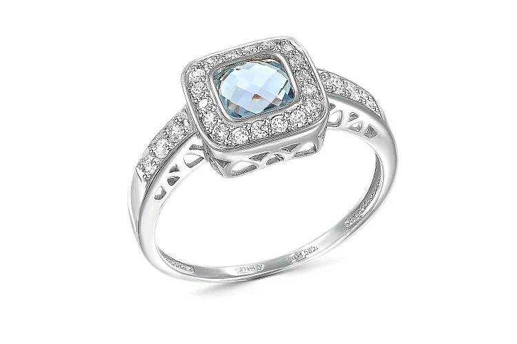 Кольцо из белого золота с топазом sky и 24 фианитами
