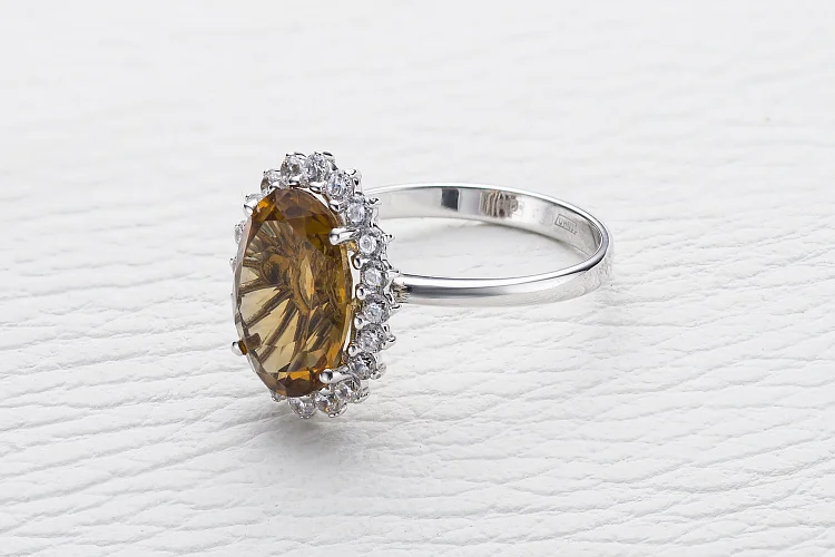 Кольцо из белого золота с султанитом и 20 фианитами