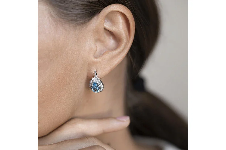 Серьги из белого золота с 2 топазами swiss и 76 фианитами