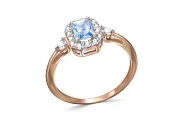 Кольцо из красного золота с топазом sky и 16 фианитами
