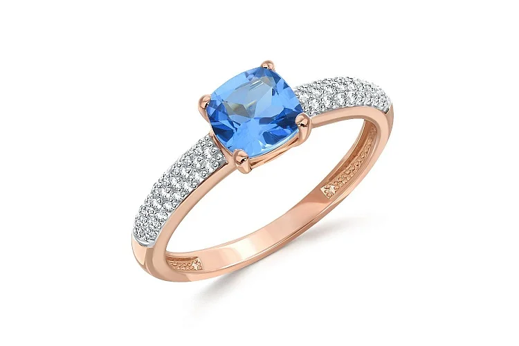 Кольцо из красного золота с топазом swiss и 50 фианитами
