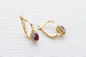 Серьги из жёлтого золота с 2 рубинами и 24 бриллиантами