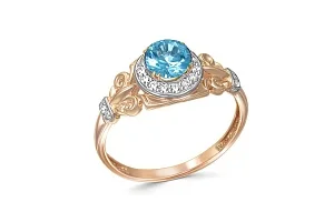 Кольцо из красного золота с топазом swiss и 21 фианитами