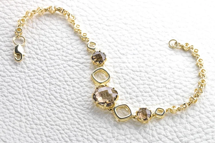 Браслет из жёлтого золота с 3 раухтопазами