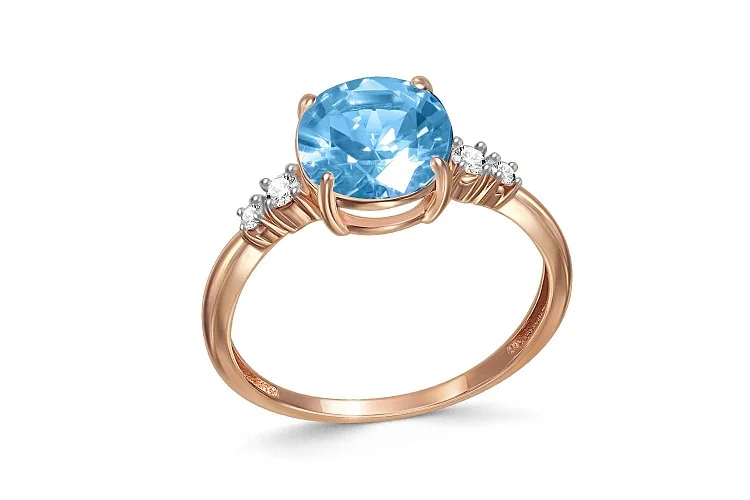 Кольцо из красного золота с топазом swiss и 4 фианитами