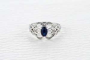 Кольцо из белого золота с корундом и 14 бриллиантами