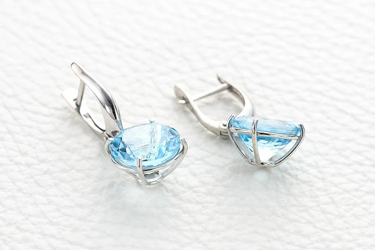 Серьги из белого золота с 2 топазами sky