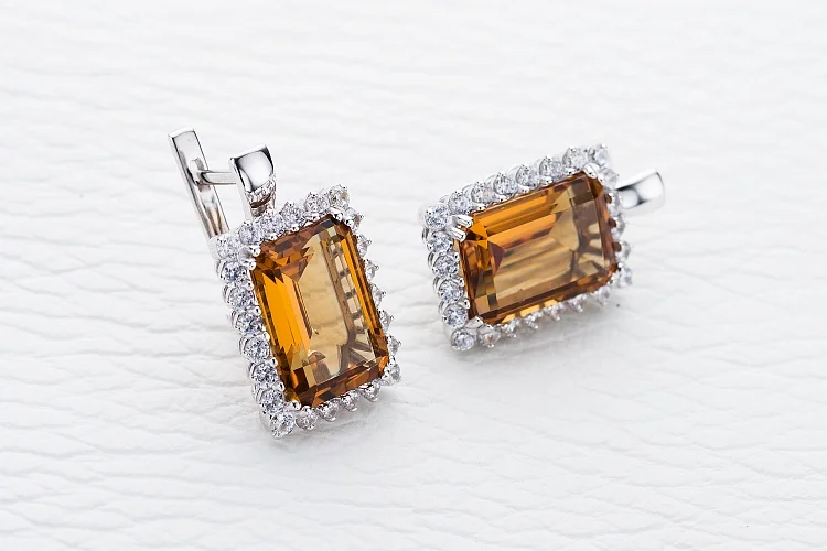 Серьги из белого золота с 2 султанитами и 48 фианитами