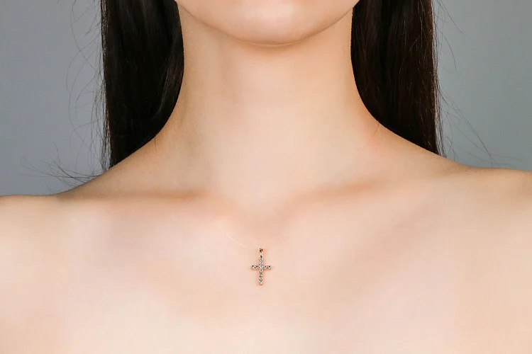 Крест из красного золота с 11 топазами swiss