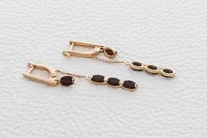 Серьги из красного золота с 8 гранатами