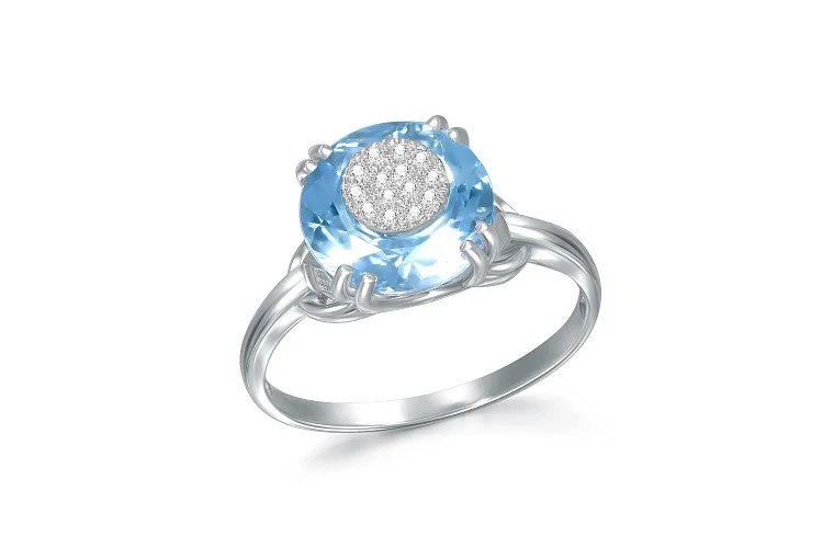 Кольцо из белого золота с топазом swiss и 14 бриллиантами