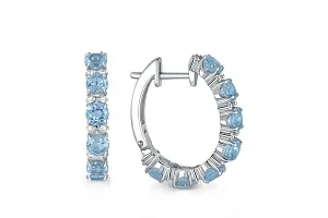 Серьги из белого золота с 14 топазами sky и 32 фианитами