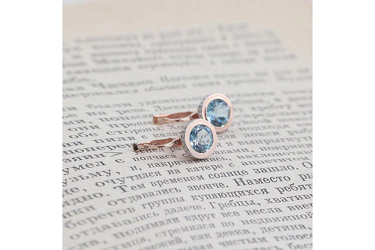 Серьги из красного золота с 2 топазами sky и 52 фианитами