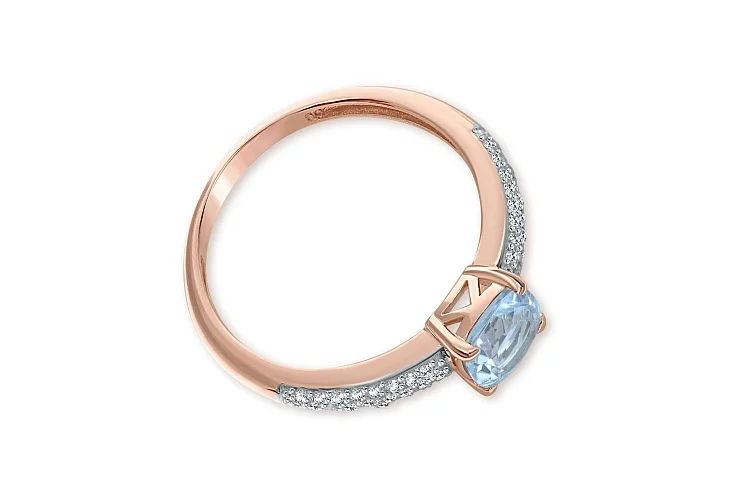 Кольцо из красного золота с топазом sky и 50 фианитами