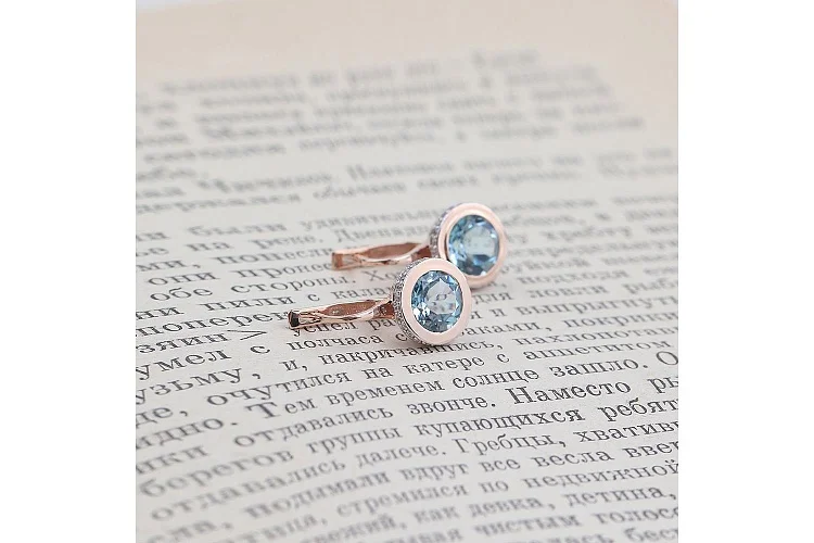 Серьги из красного золота с 2 топазами sky и 52 фианитами