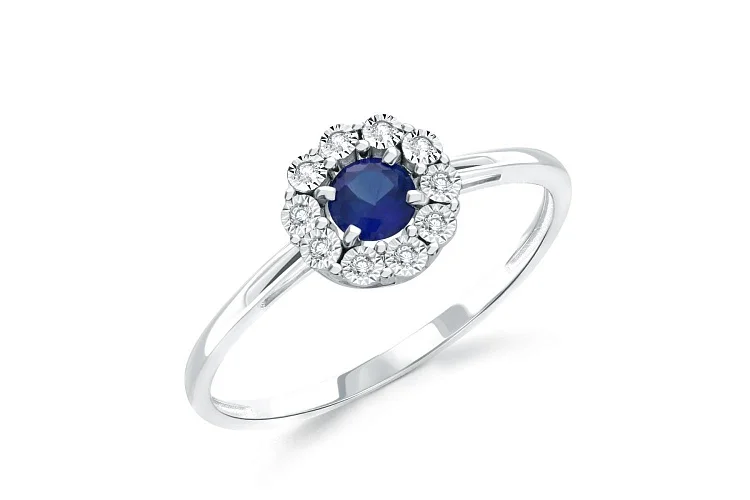 Кольцо из белого золота с корундом и 10 фианитами