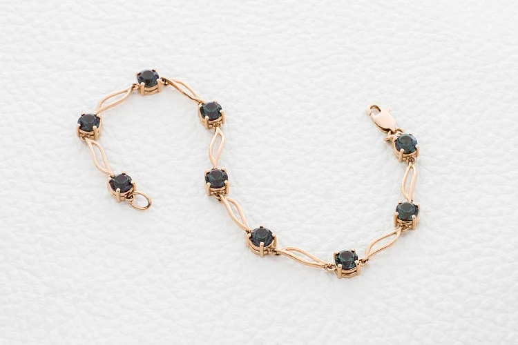 Браслет Дорожка из красного золота с 9 александритами