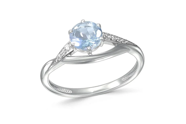 Кольцо из белого золота с топазом sky и 7 фианитами